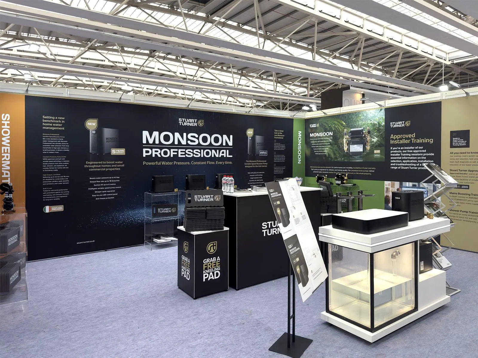 Seamless shell scheme exhibition stand upgrade with branded graphics and counters at Plumbex Dublin 2025.